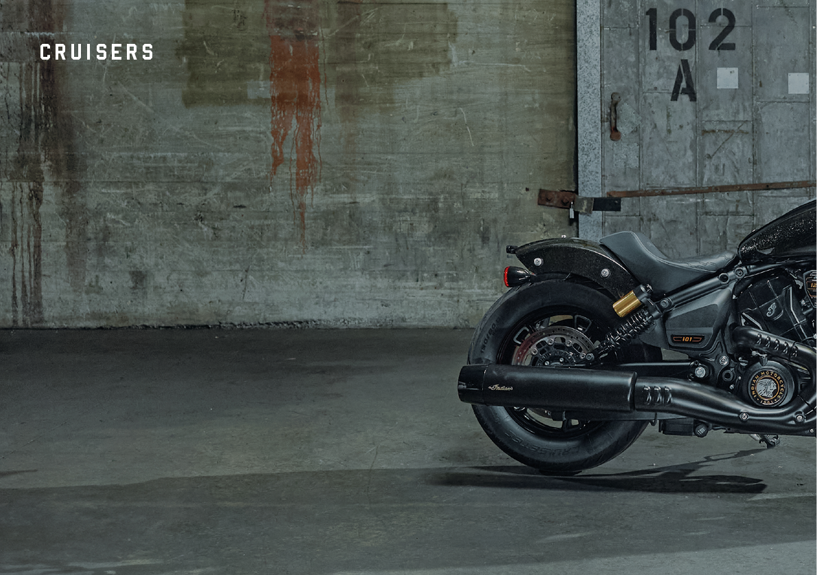 A black motorcycle is parked in a garage. AI generated content